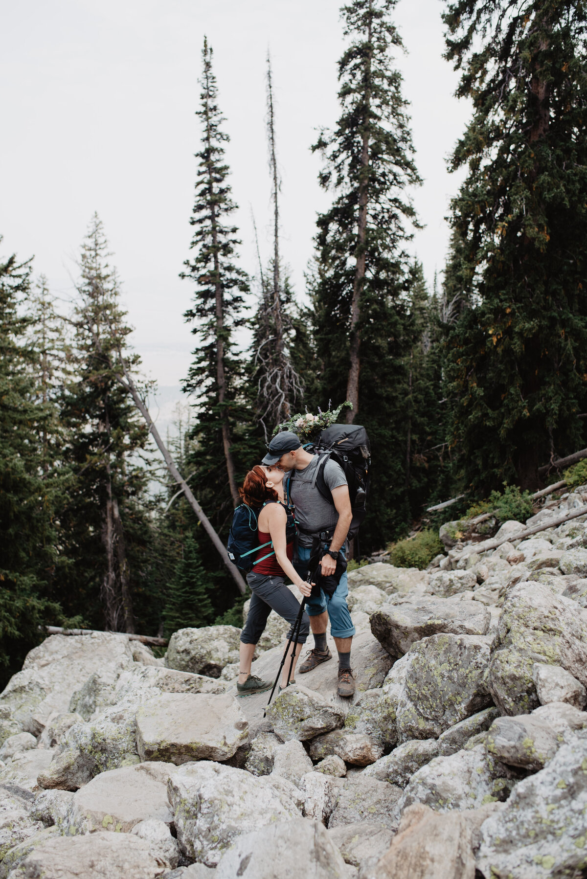 Jackson Hole photographers captures man kissing woman during hike