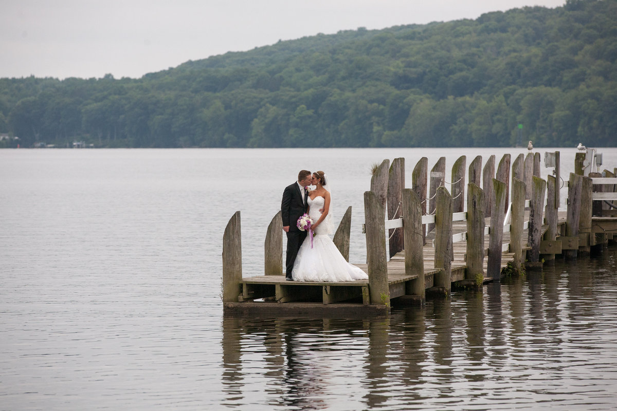 Bride and groom on a dock in a CT Wedding