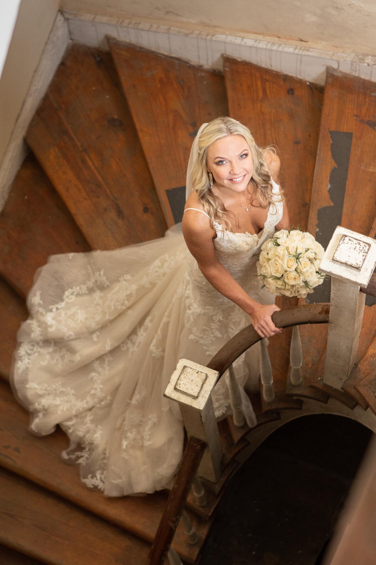 The bride poses for a photo at the Pharmacy Museum in New Orleans, Louisiana.