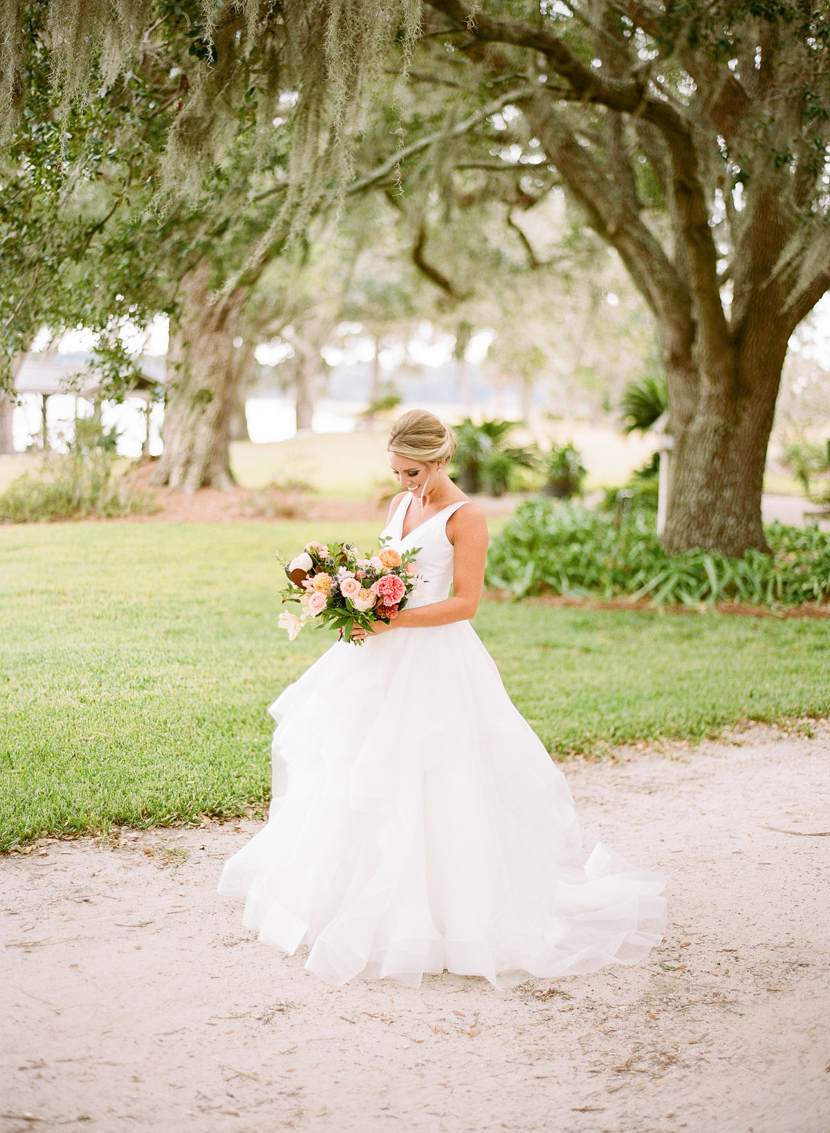 Bride Alexis in Modern Trousseau Ball Gown with Colorful bouquet from Branch Design Studio Charleston Wedding