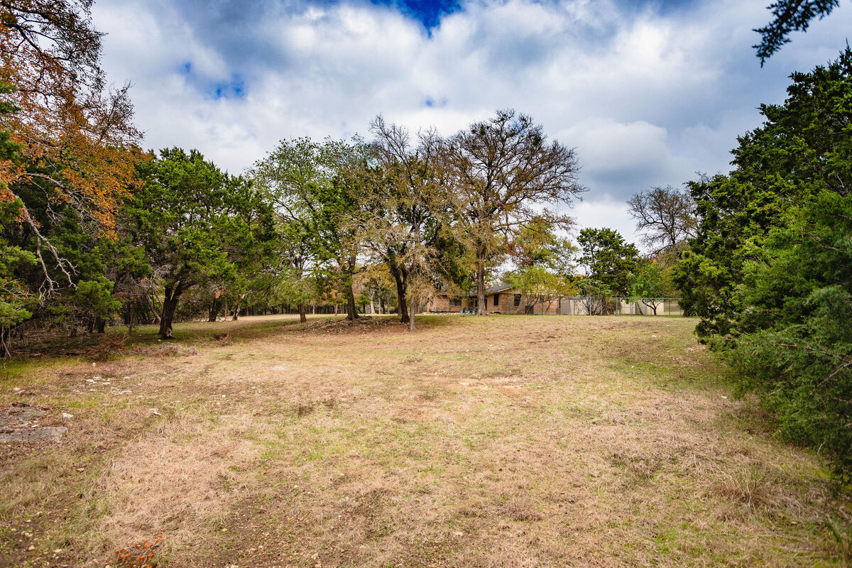 Spacious yard with beautiful trees at this three-bedroom, two-bathroom ranch house for 7 with incredible hiking, wildlife and views.