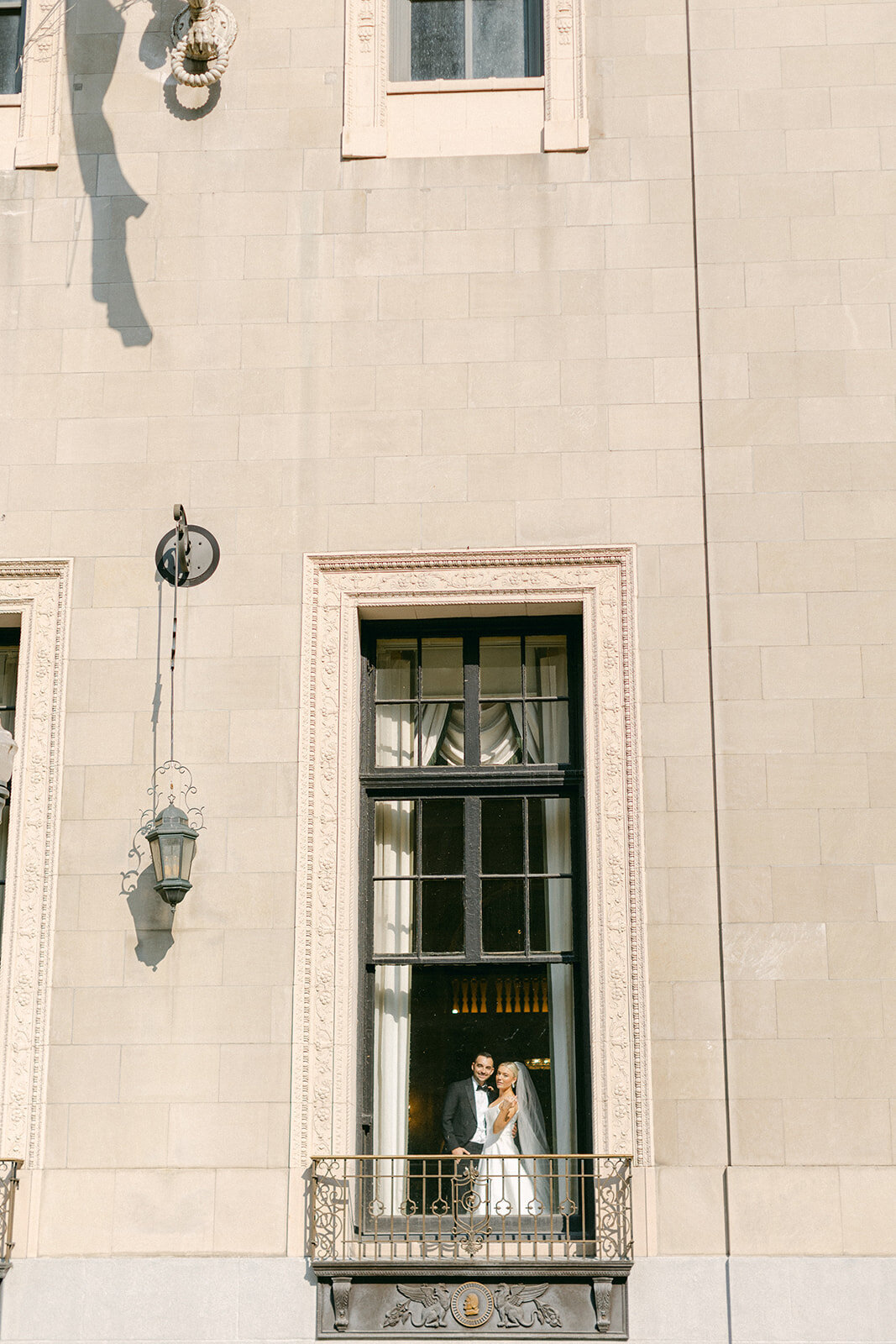 Bride and groom celebrating at the Omni William Penn Hotel wedding in Pittsburgh