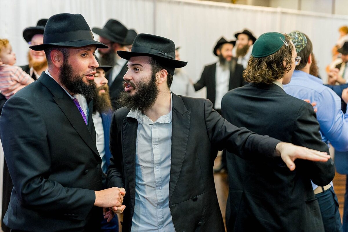 Eliana-Melmed-Photography-Chicago-LosAngeles-Jewish-WeddingPhotographer-CarmiKalman-MensDancing-00111