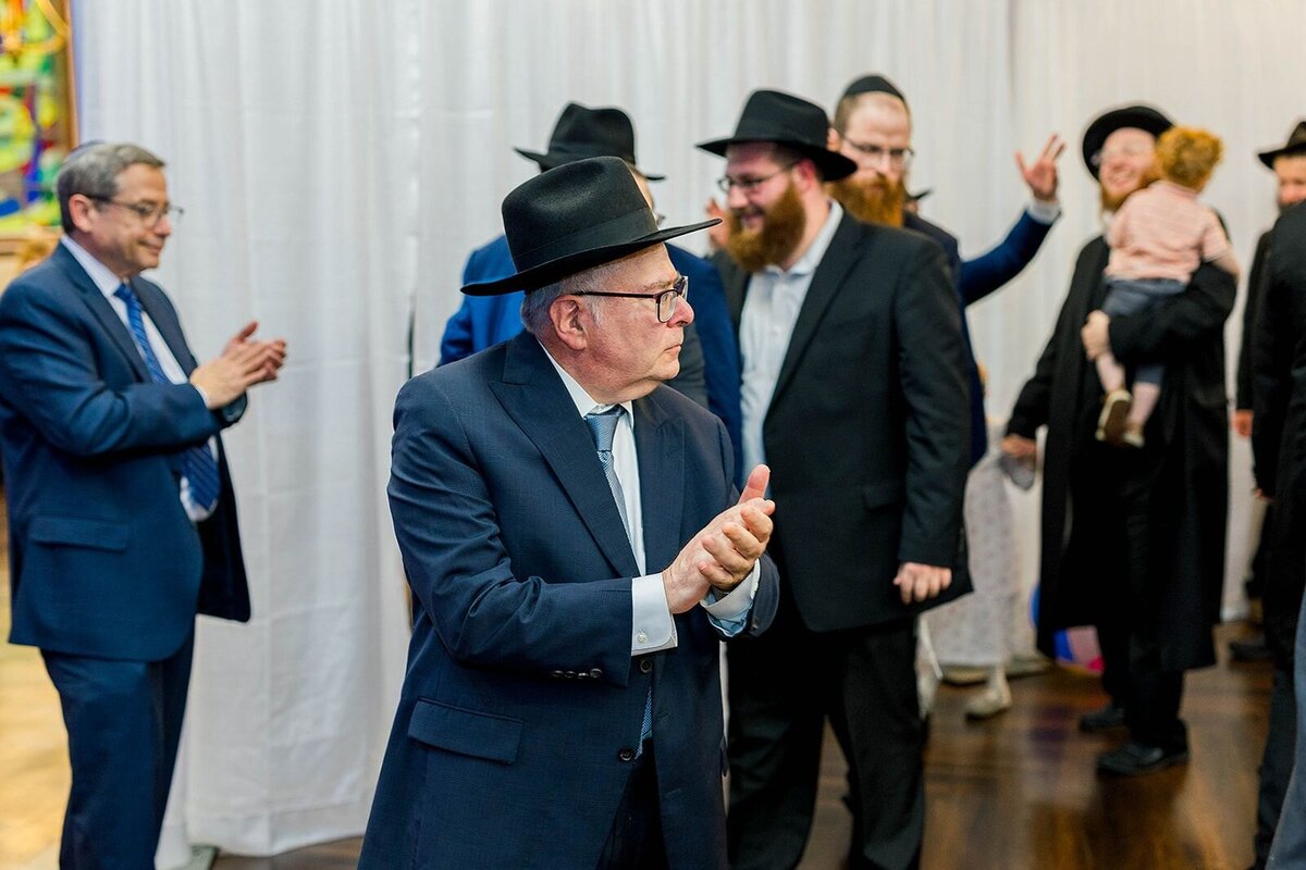 Eliana-Melmed-Photography-Chicago-LosAngeles-Jewish-WeddingPhotographer-CarmiKalman-MensDancing-00118