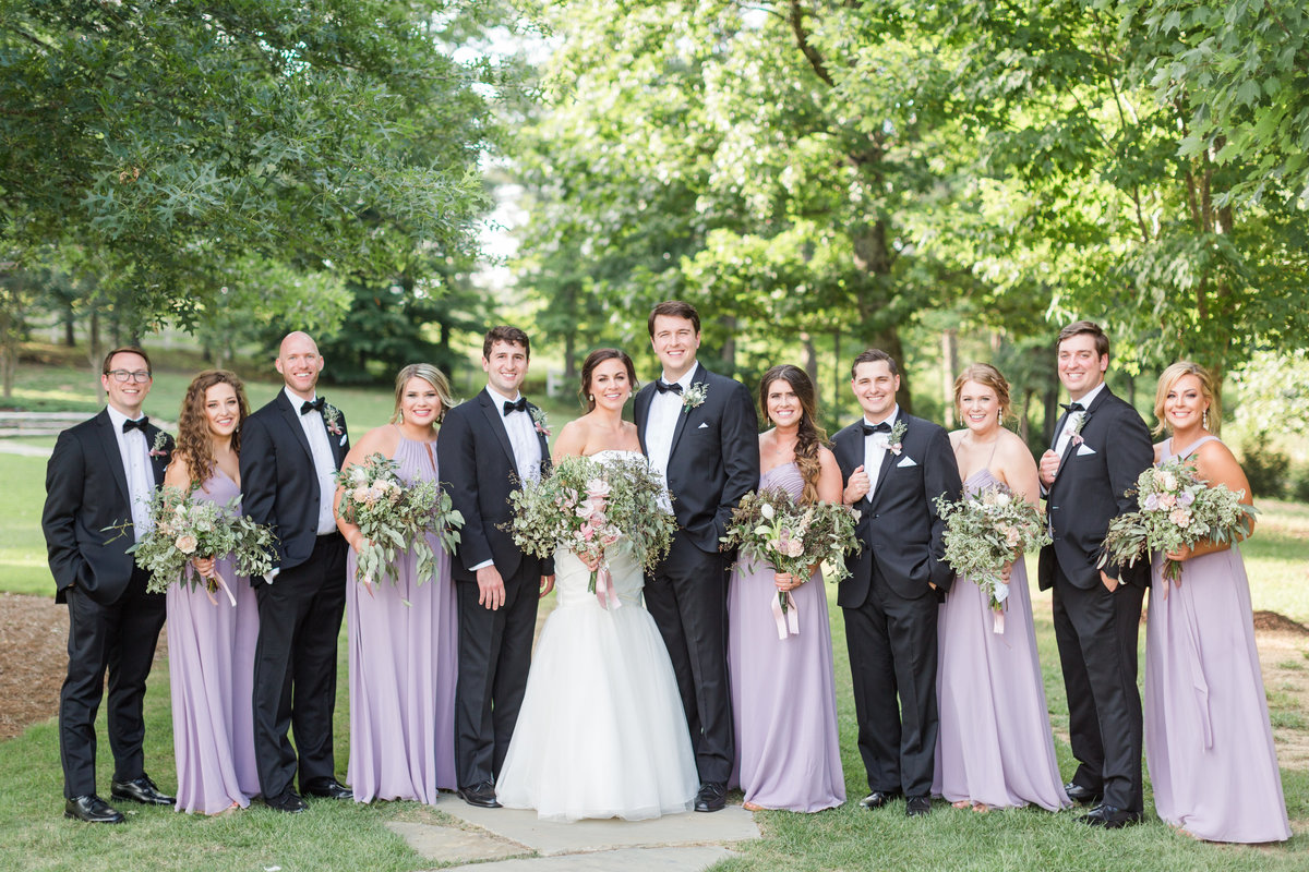 bride and groom with bridesmaids and groomsmen; The Barn at Shady Lane in Birmingham, Alabama