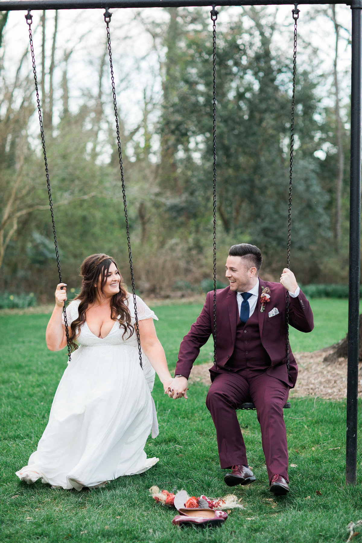 Wedding Photographer, couple swinging together