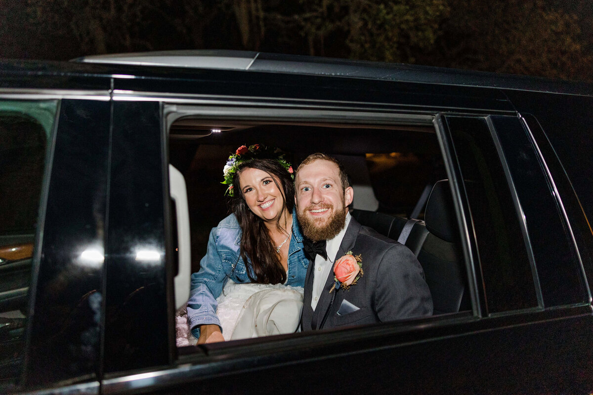 bride and groom exit in limo car at Hayes Hollow Hidden Falls in Spring Branch