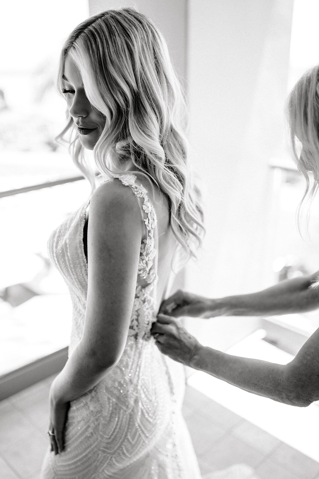 Bride getting ready at Dolphin Bay Resort in Pismo Beach, CA