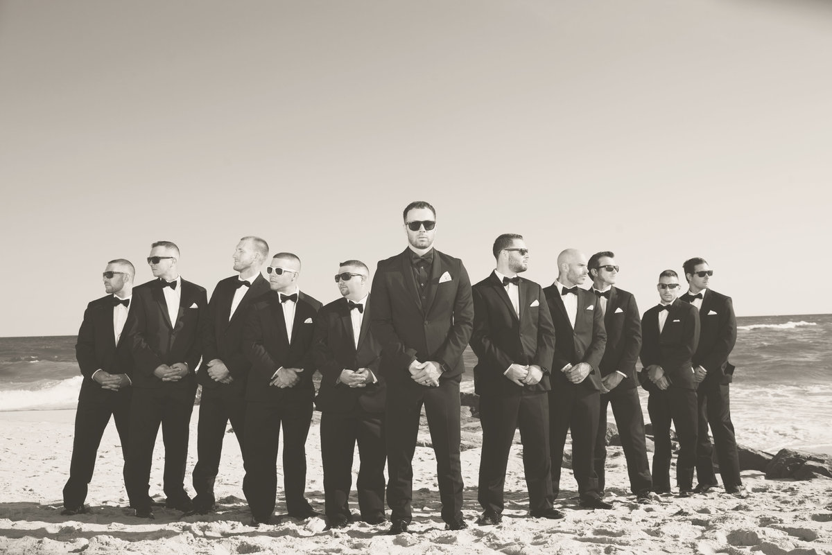 Black and white photo of groomsmen at Oceanbleu beach
