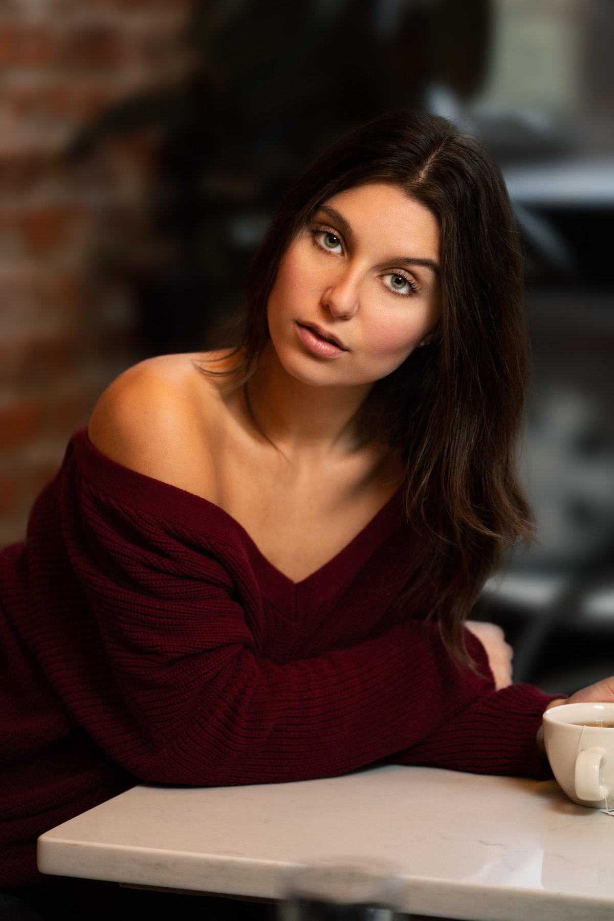 PORTRAIT OF A GIRL IN A COFFEE SHOP
