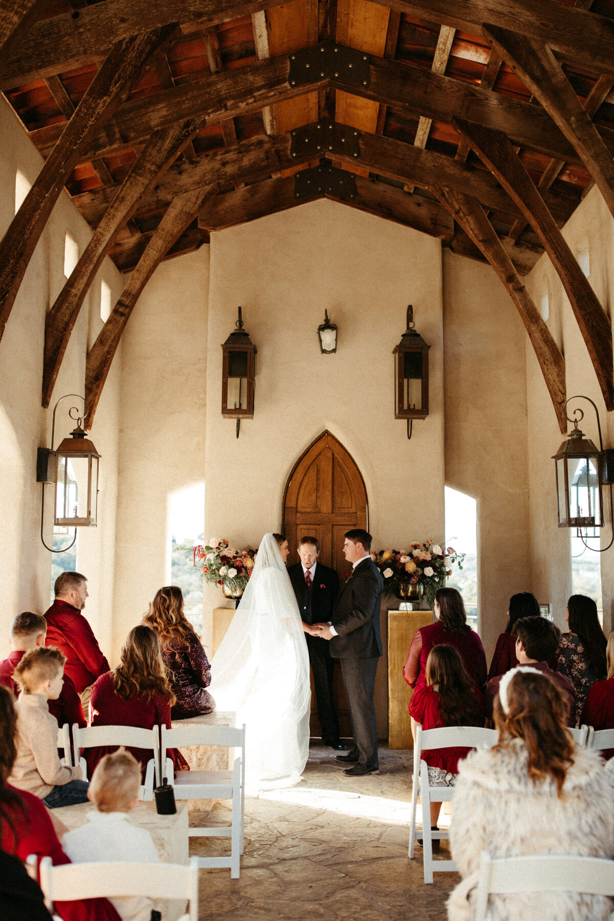 Bride and groom exchanging vows during their intimate wedding ceremony at Chapel Dulcinea