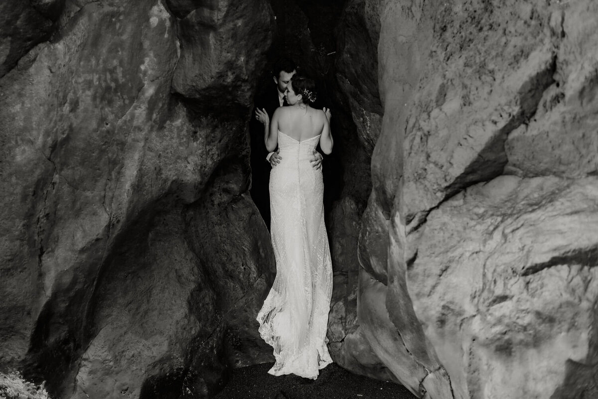 Elopement in Maui couple standing in cave