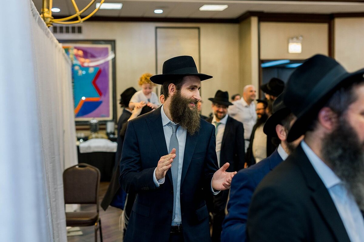 Eliana-Melmed-Photography-Chicago-LosAngeles-Jewish-WeddingPhotographer-CarmiKalman-MensDancing-00121