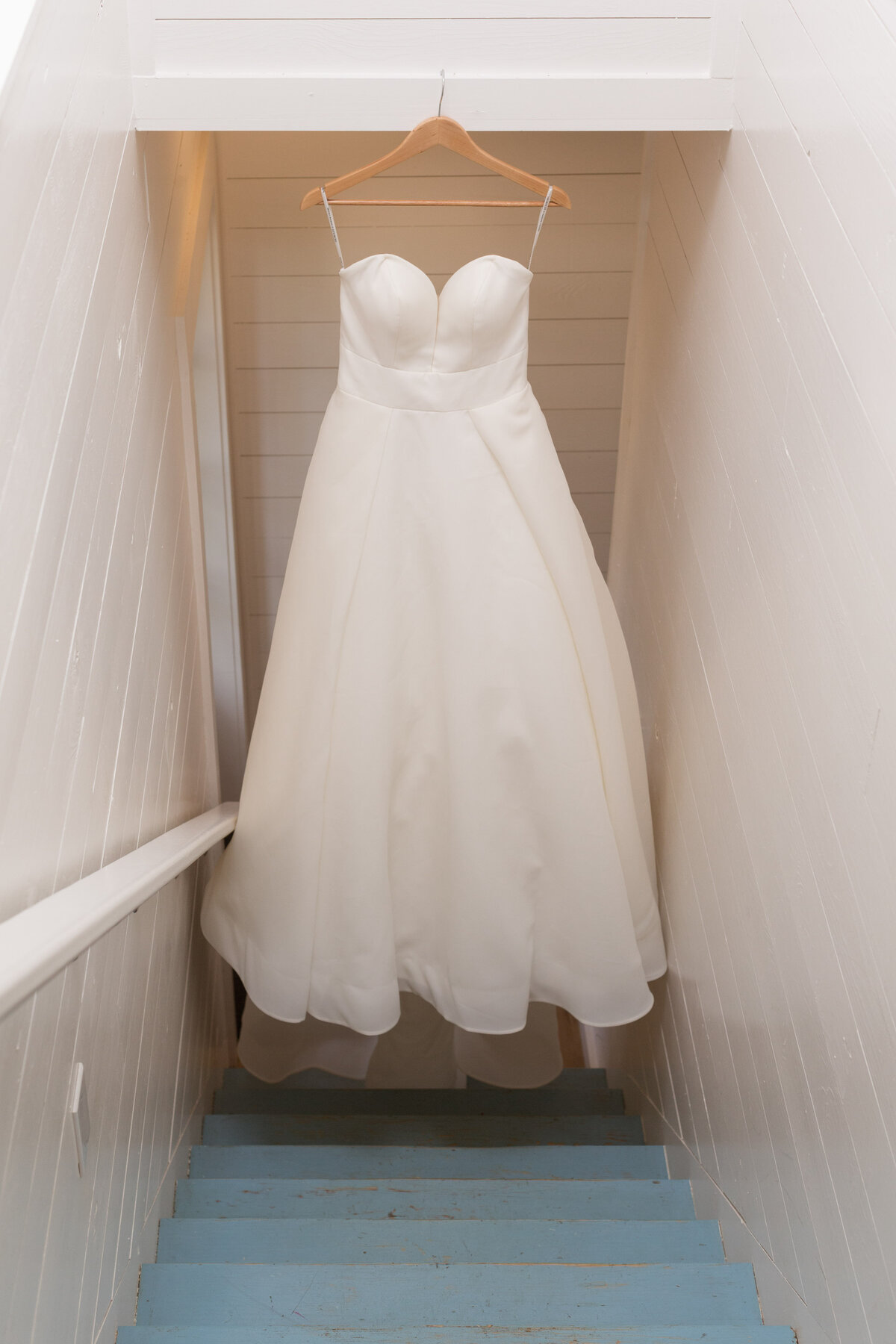 Wedding dress detail photo on stairs