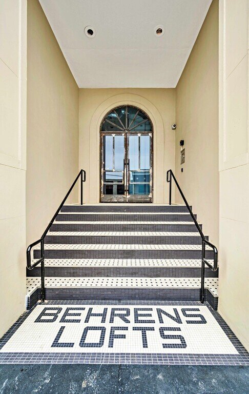 Main entrance to the historic Behrens Lofts building which holds this 2 bedroom, 2.5 bathroom luxury vacation rental loft condo for 8 guests with incredible downtown views, free parking, free wifi and professional decor in downtown Waco, TX.