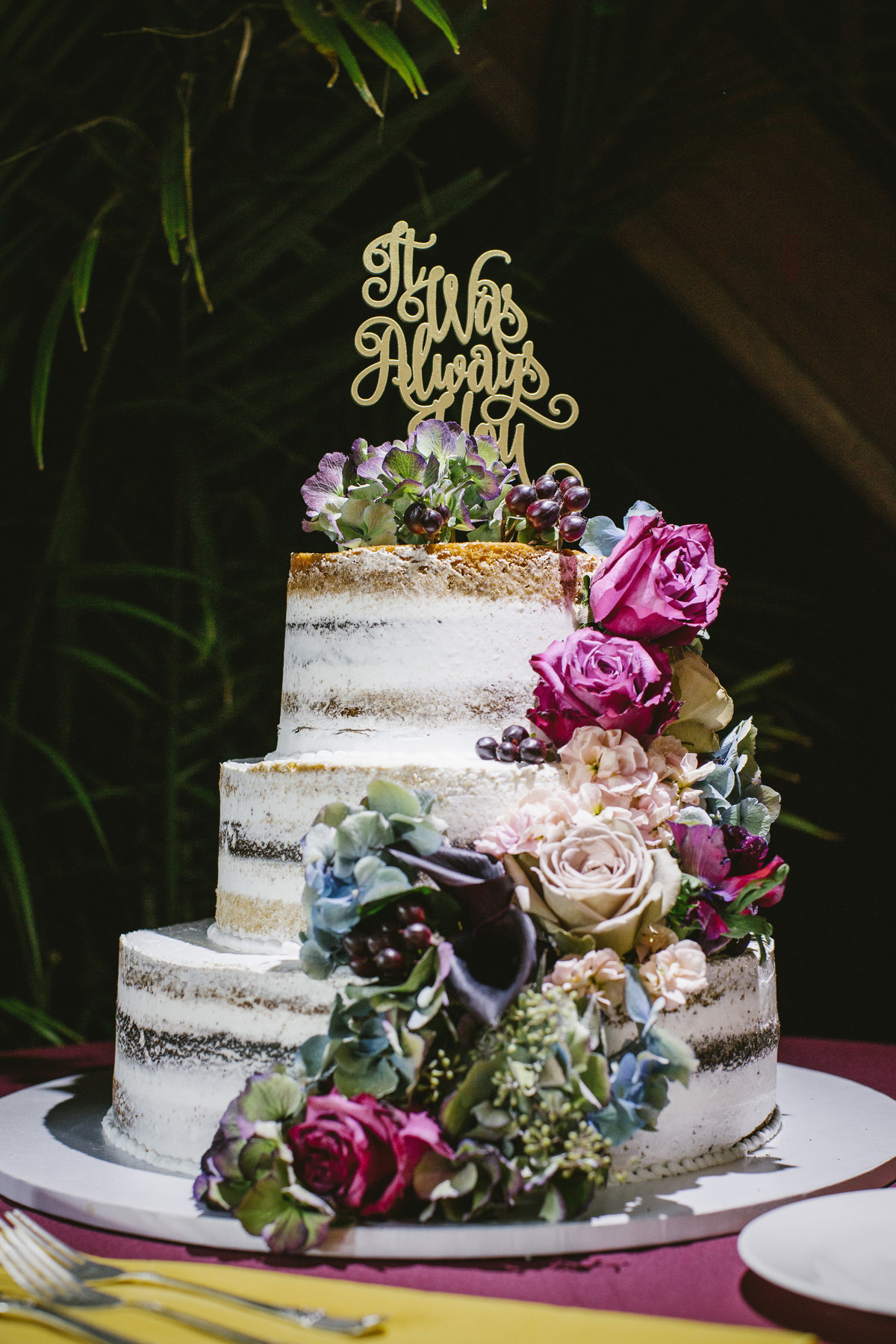 naked wedding cake with flowers at water witch club