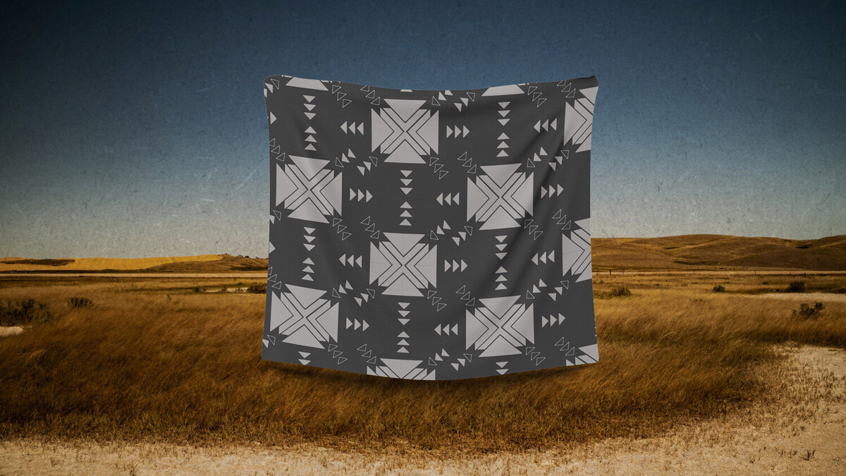 Rural landscape background with Navajo brand pattern on bandana mockup.