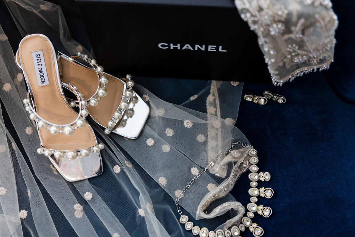 Bridal accessories including bridal jewelry and Chanel shoes.