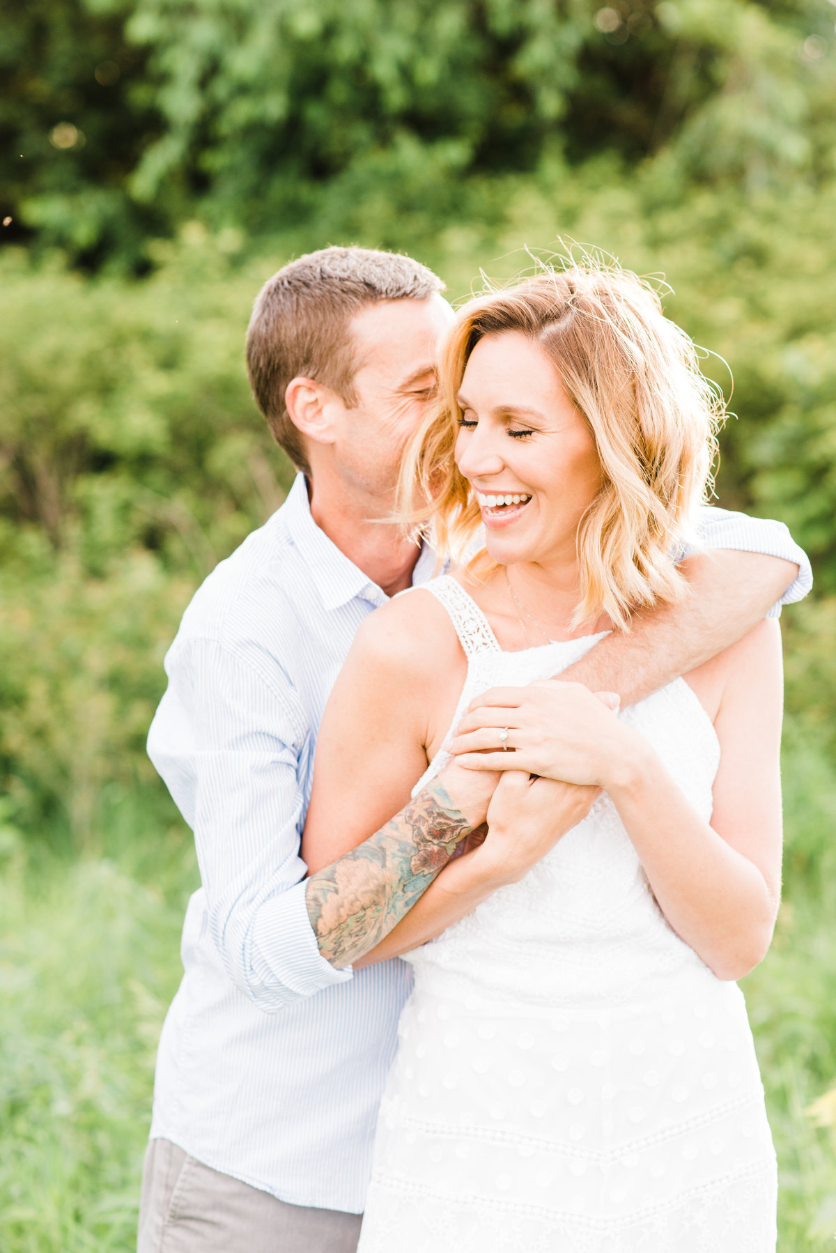outdoor summer engagement session with iowa wedding photographer mississippi pearl photography