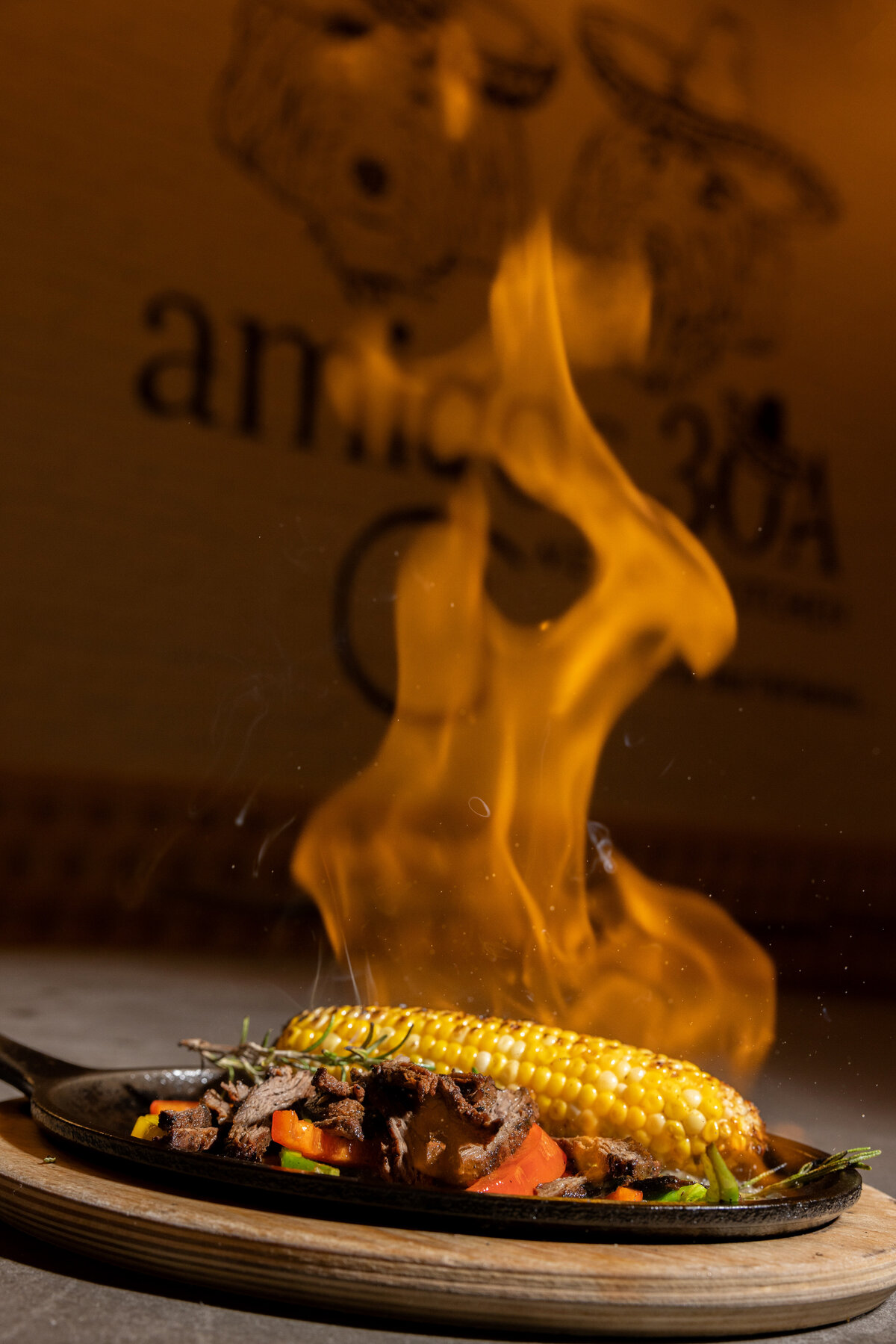 A flaming skillet of food