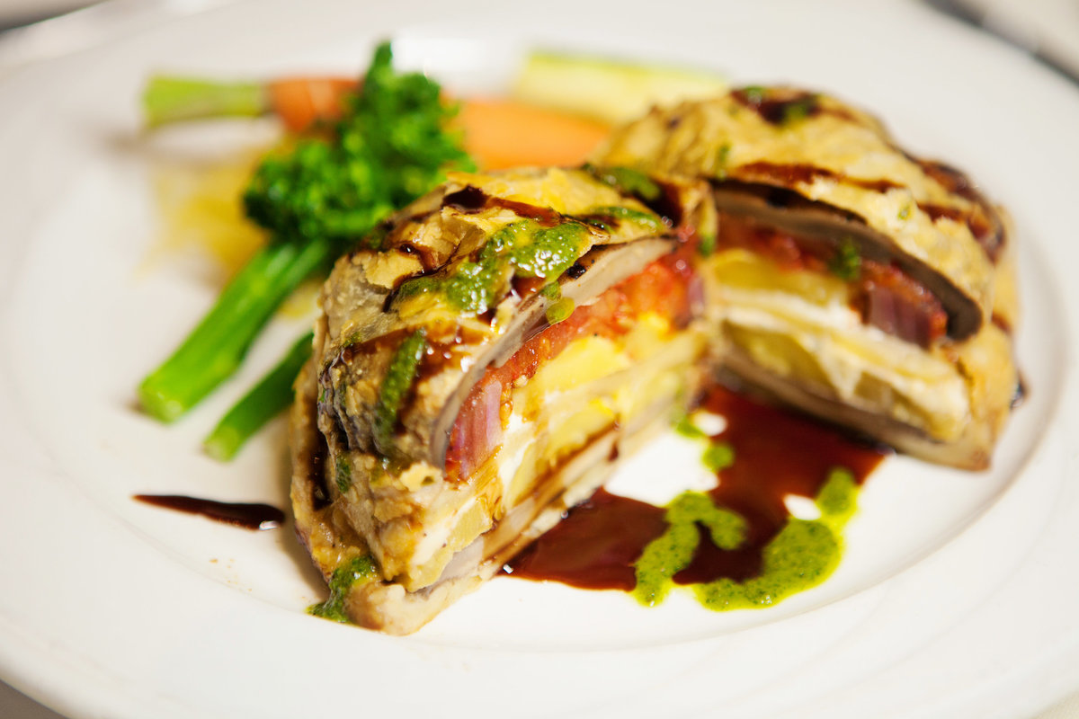 Portabella mushroom, sun-dried tomato, red onion, & blue cheese all wrapped in puff pastry