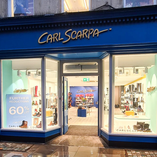 Carl Scarpa Gold Signage