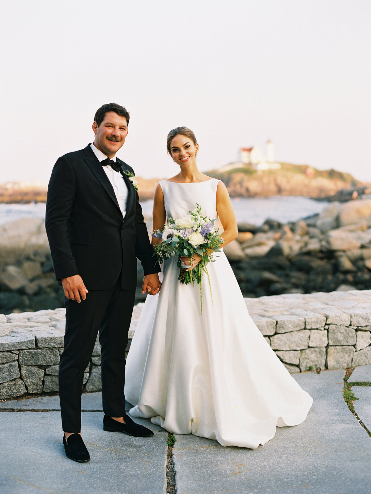 bride and groom wedding portraits at oceanside wedding in York, Maine