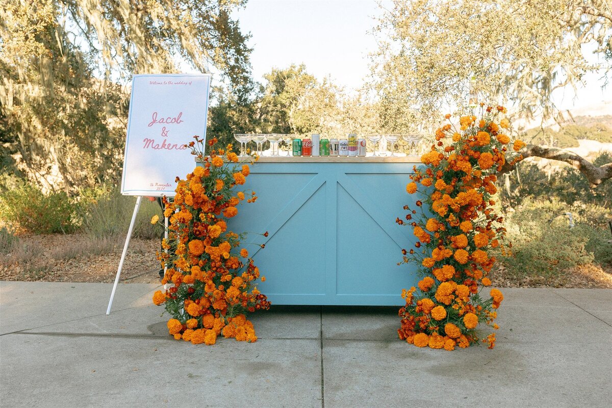 Carmel Valley wedding bar marigold installation
