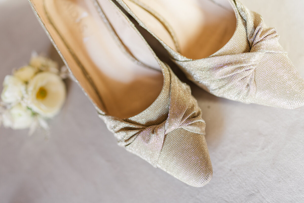 Gold wedding shoe details