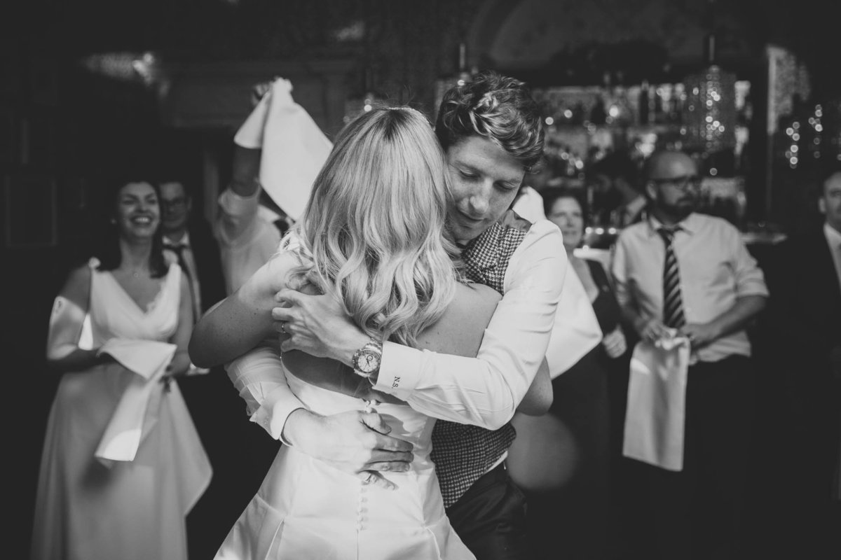The bride and groom on the dancefloor during the first dance at Babington house
