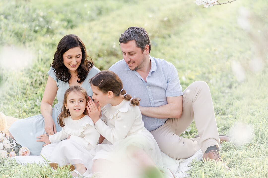 Lifestyle family photo session in Brisbane's serene plum blossom orchard; candid and genuine.