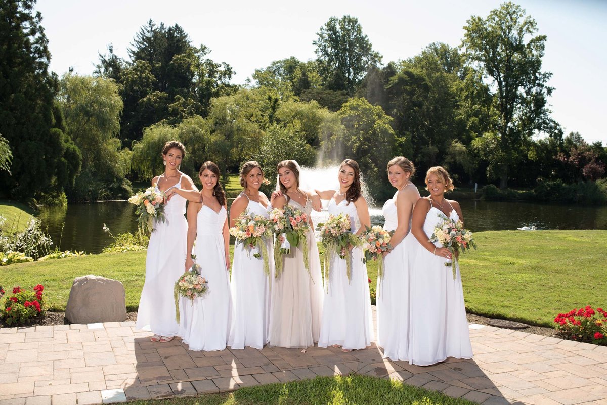 Bride and bridesmaids outside at Flowerfield