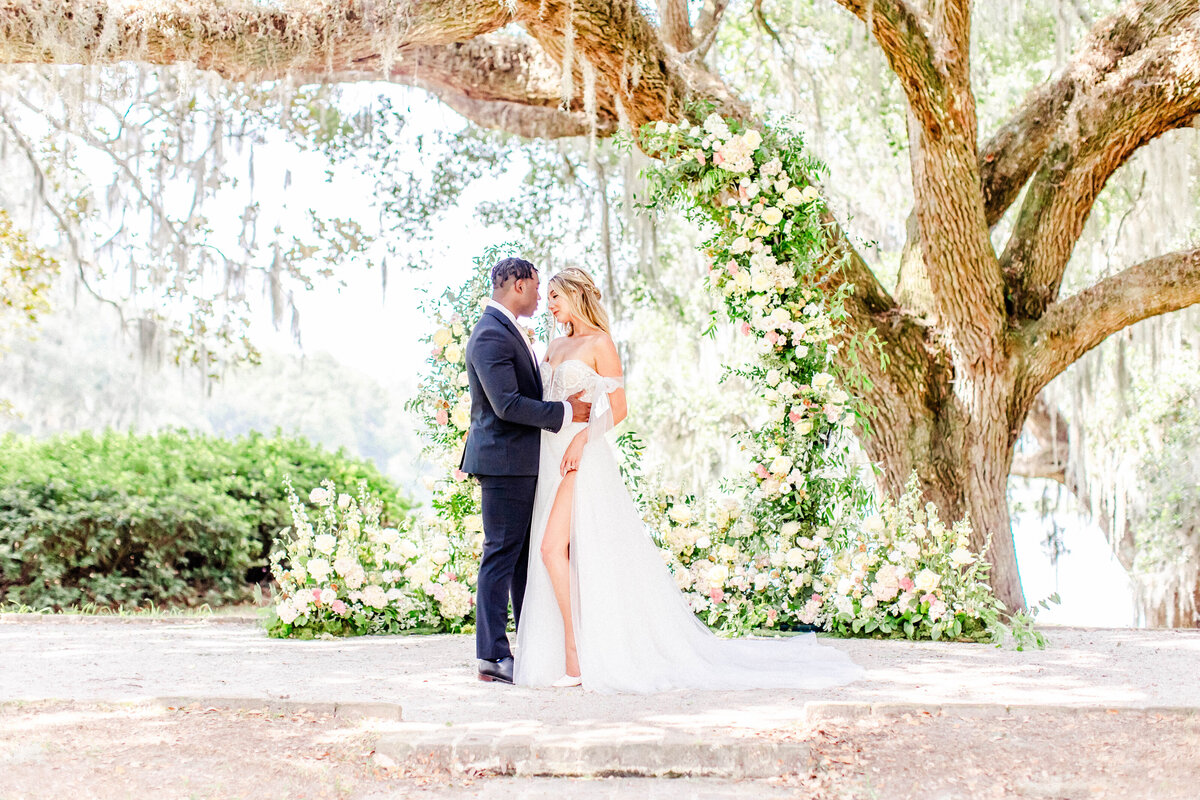 fine art wedding photos of bride and groom under a tree