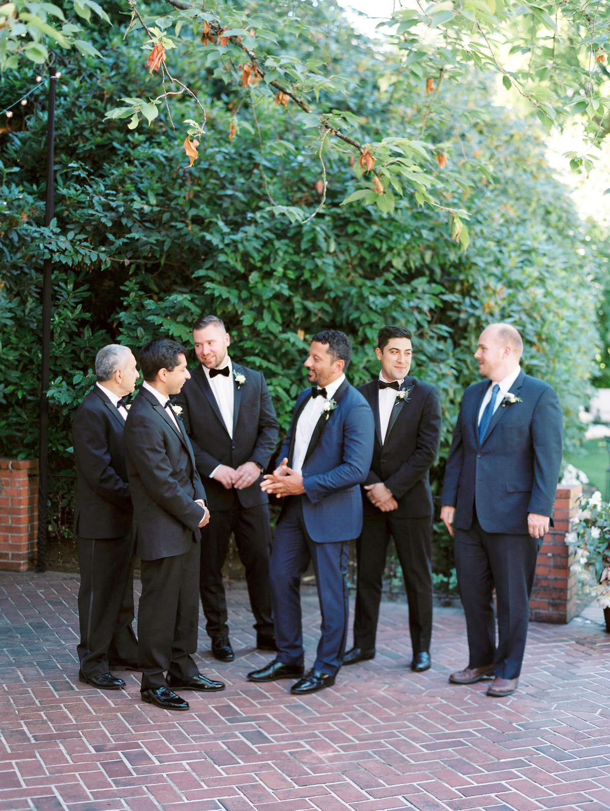 a groom with his groomsmen at the town club