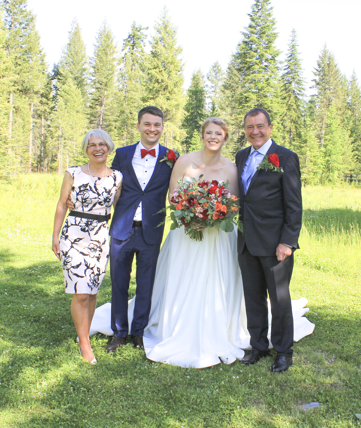 Bride and groom with parents