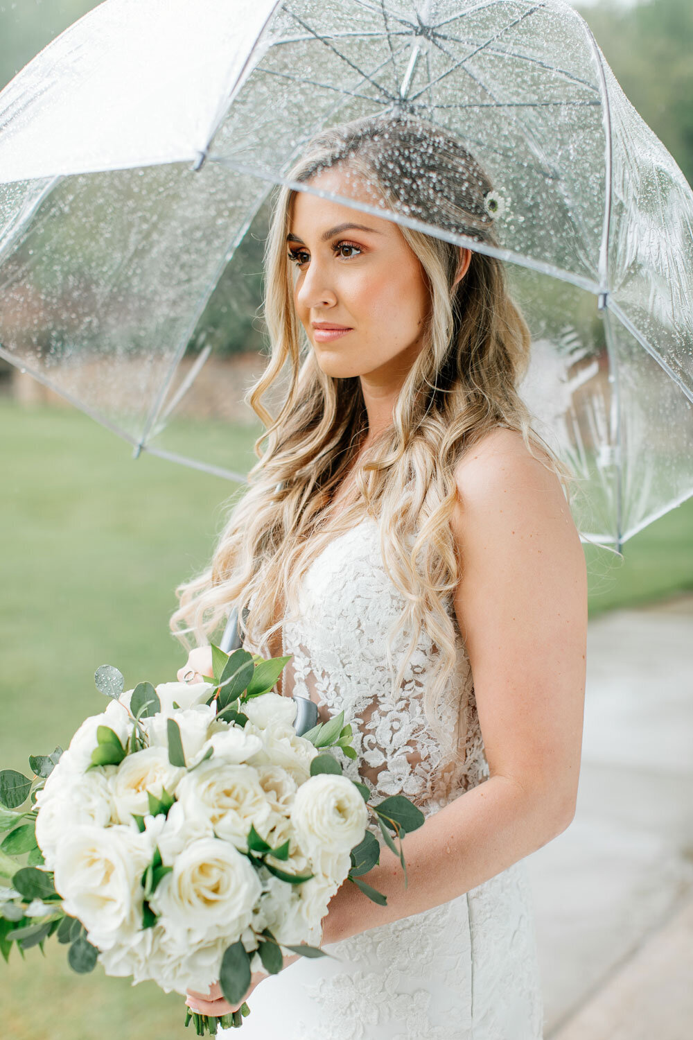 rainy wedding day bride with clear umbrella pretty rain photos