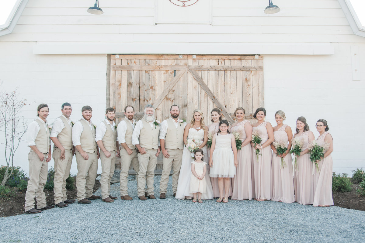 Outdoor wedding ceremony photographed at Overlook Barn by Boone Photographer Wayfaring Wanderer. Overlook Barn is a gorgeous venue on Beech Mountain.