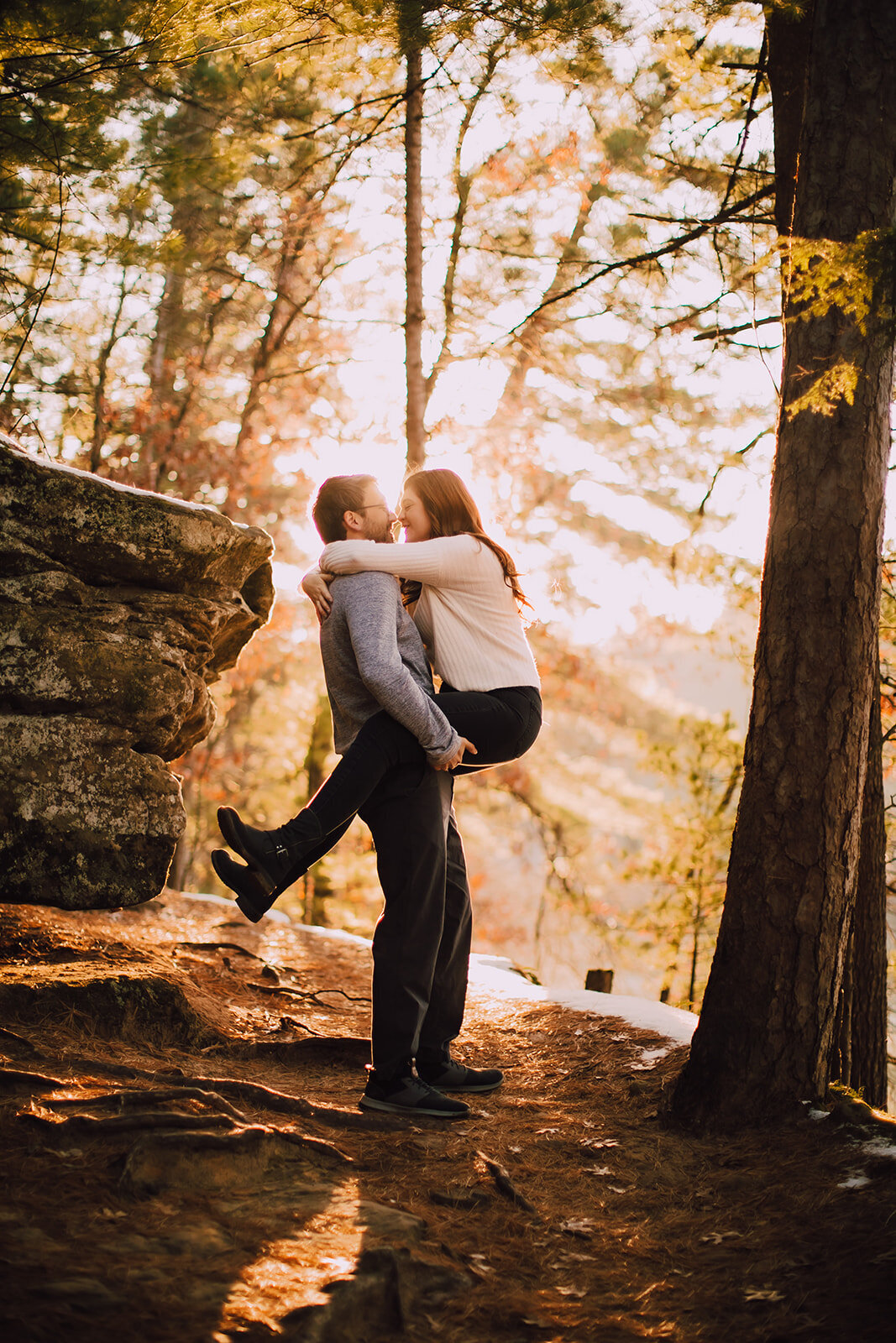 A couple takes Mirror Lake Engagement photos by O & B Photo Co