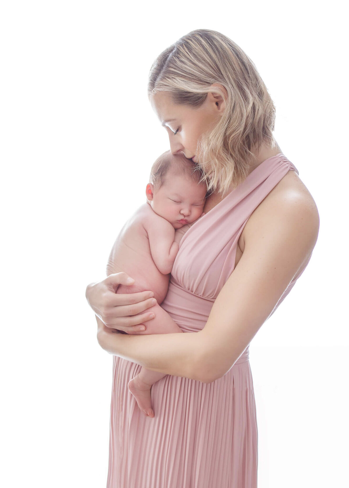 New mom with her baby girl photographed in Woodland Hills photography studio by Los Angeles Newborn Photographer