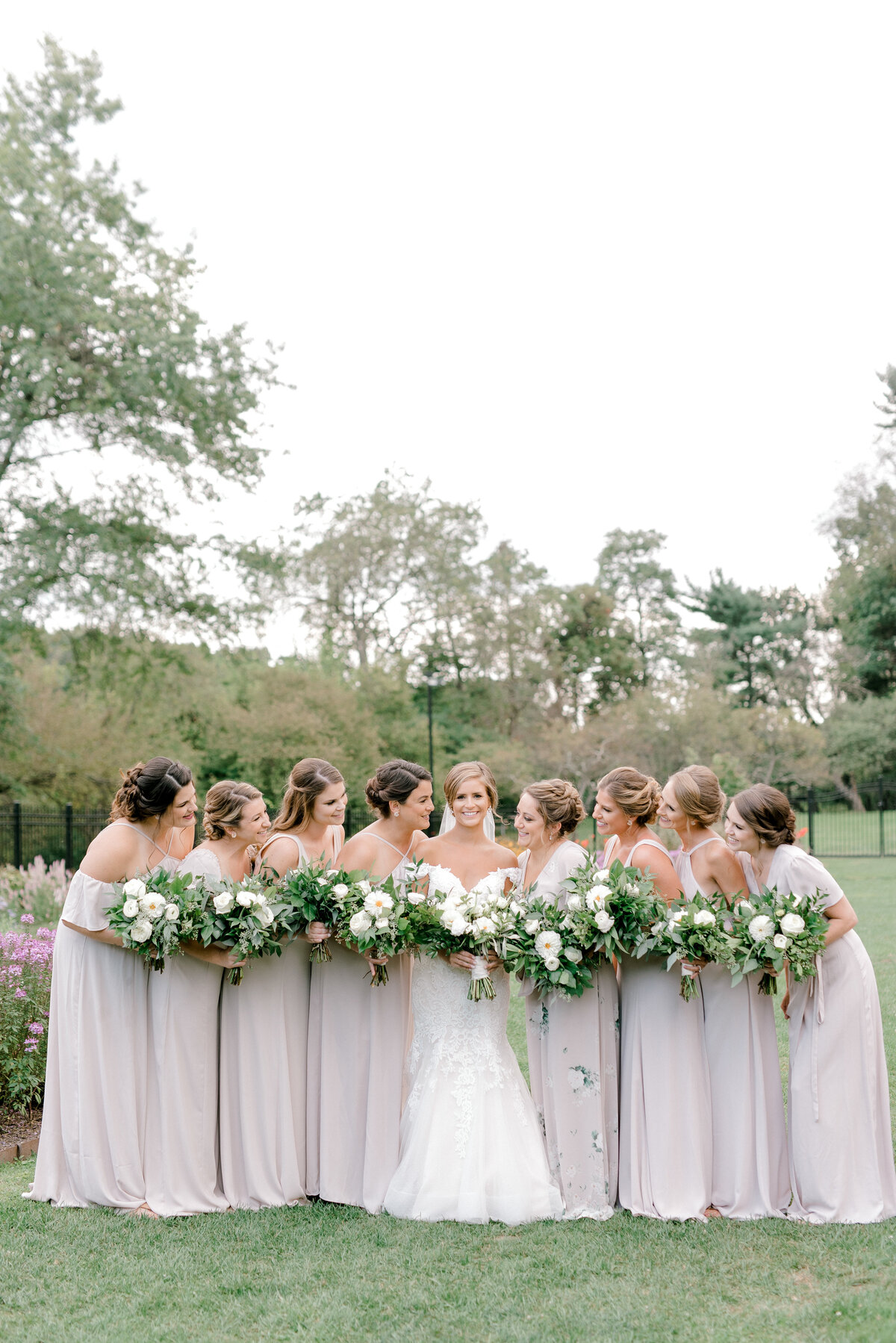 bridesmaids holding farmers daughters flowers bouquets at hartwood acres mansion in pittsburgh pa