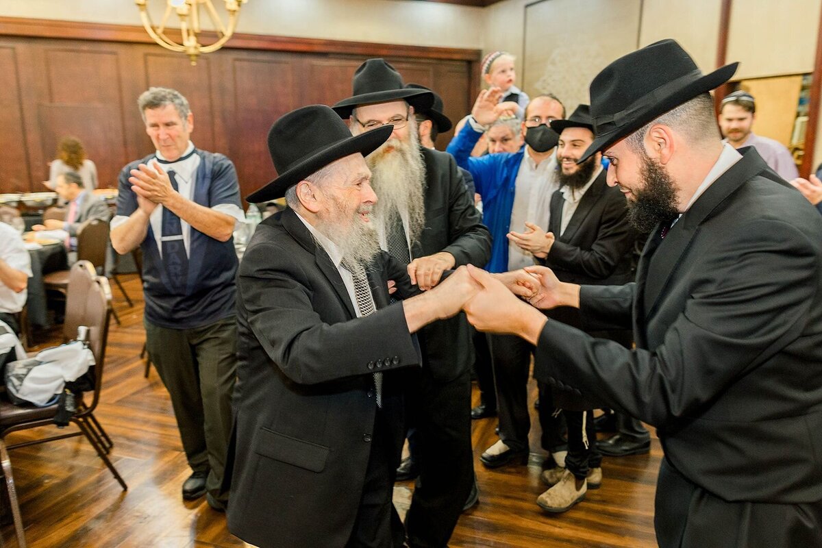 Eliana-Melmed-Photography-Chicago-LosAngeles-Jewish-WeddingPhotographer-CarmiKalman-MensDancing-00034