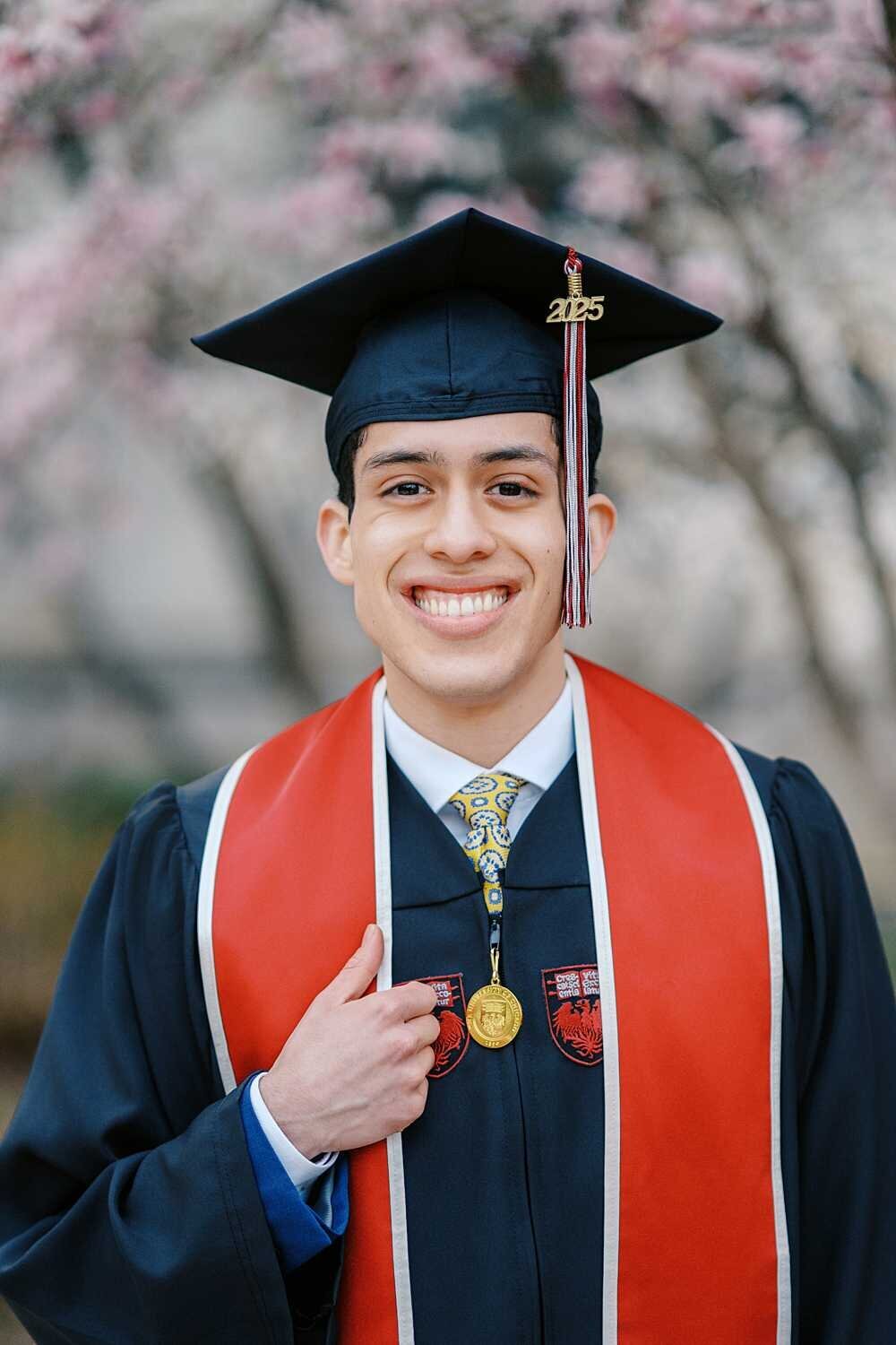 Graduating senior guy wearing a cap and gown