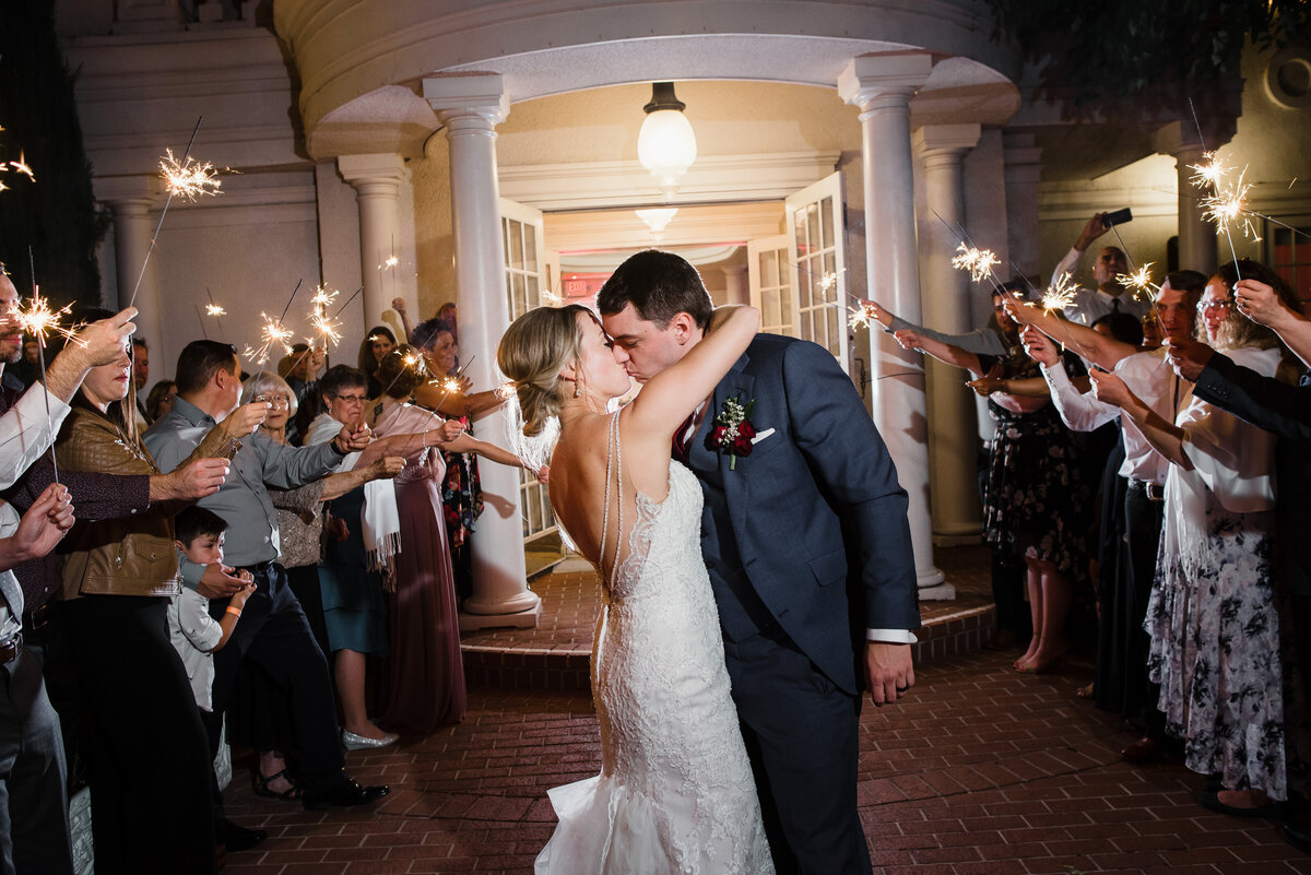 Our couple embrace as they exit the Pavilion and put their final touches on their wedding day with a sparkler exit.