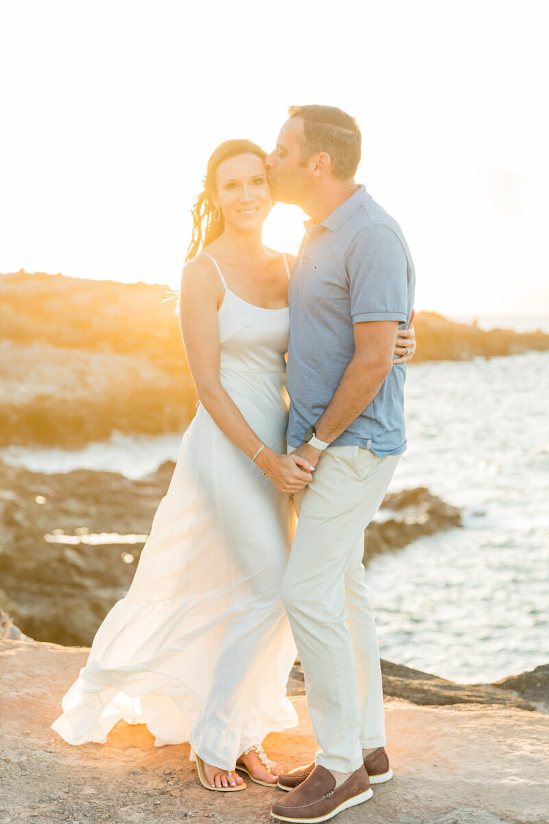 husband and wife cliffside in maui, Hawaii