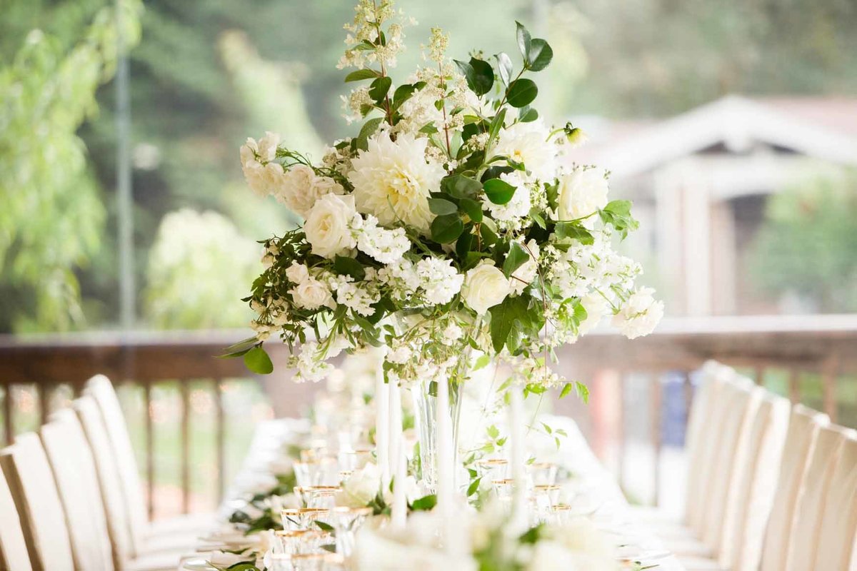 Elevated garden style arrangement with white peonies and dahlias