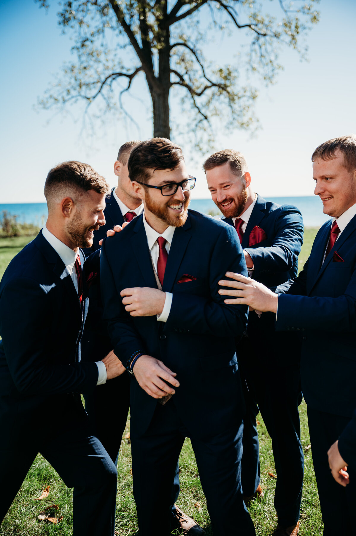 Groomsmen checking out groom