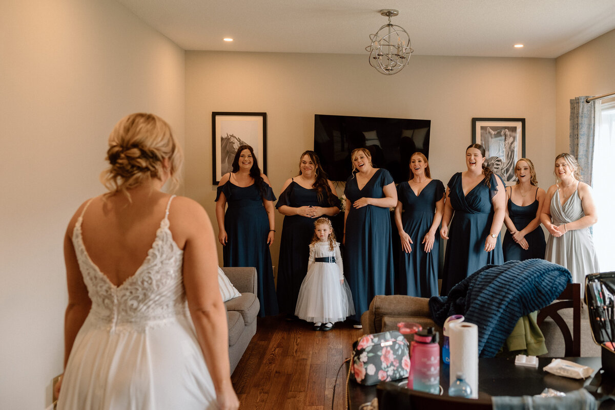 bridesmaids seeing bride for the first time
