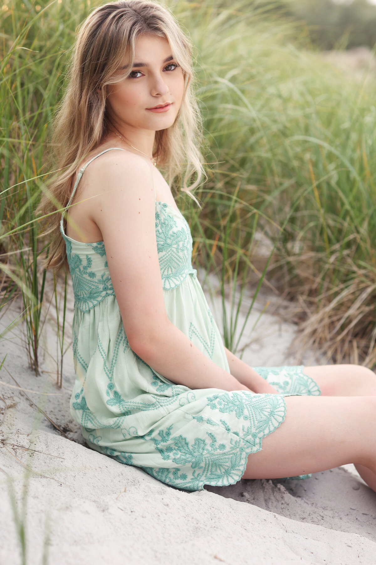 senior girl on beach grass - Kristen Zannella photography