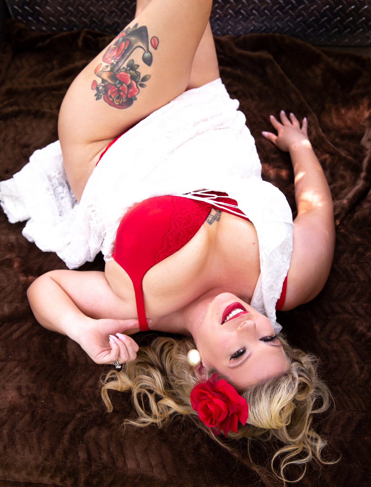 goddess studio boudoir woman pinup special white dress red bra and red flower in hair pinup style