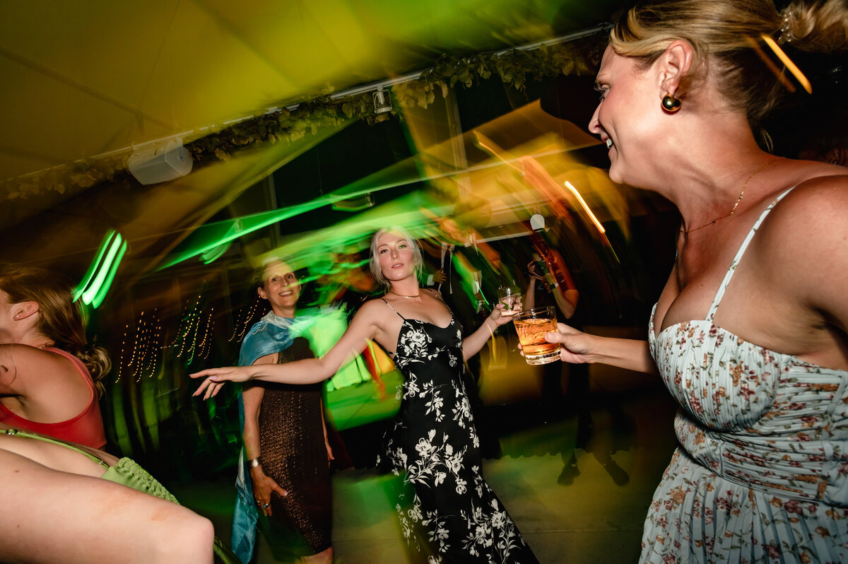 Wedding guests dance to the band at The Shore Club in Chicago, IL